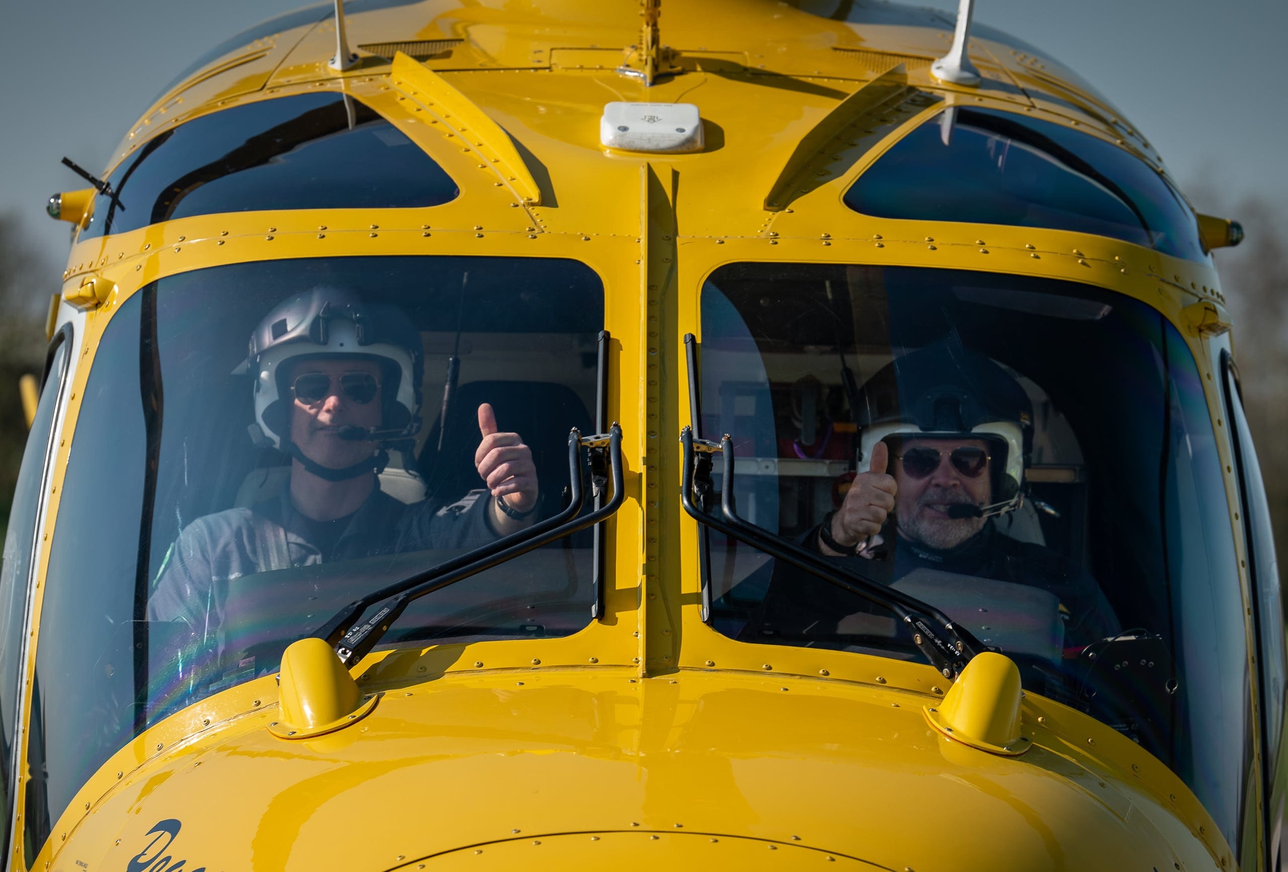 Two of the crew in the cockpit of the air ambulance
