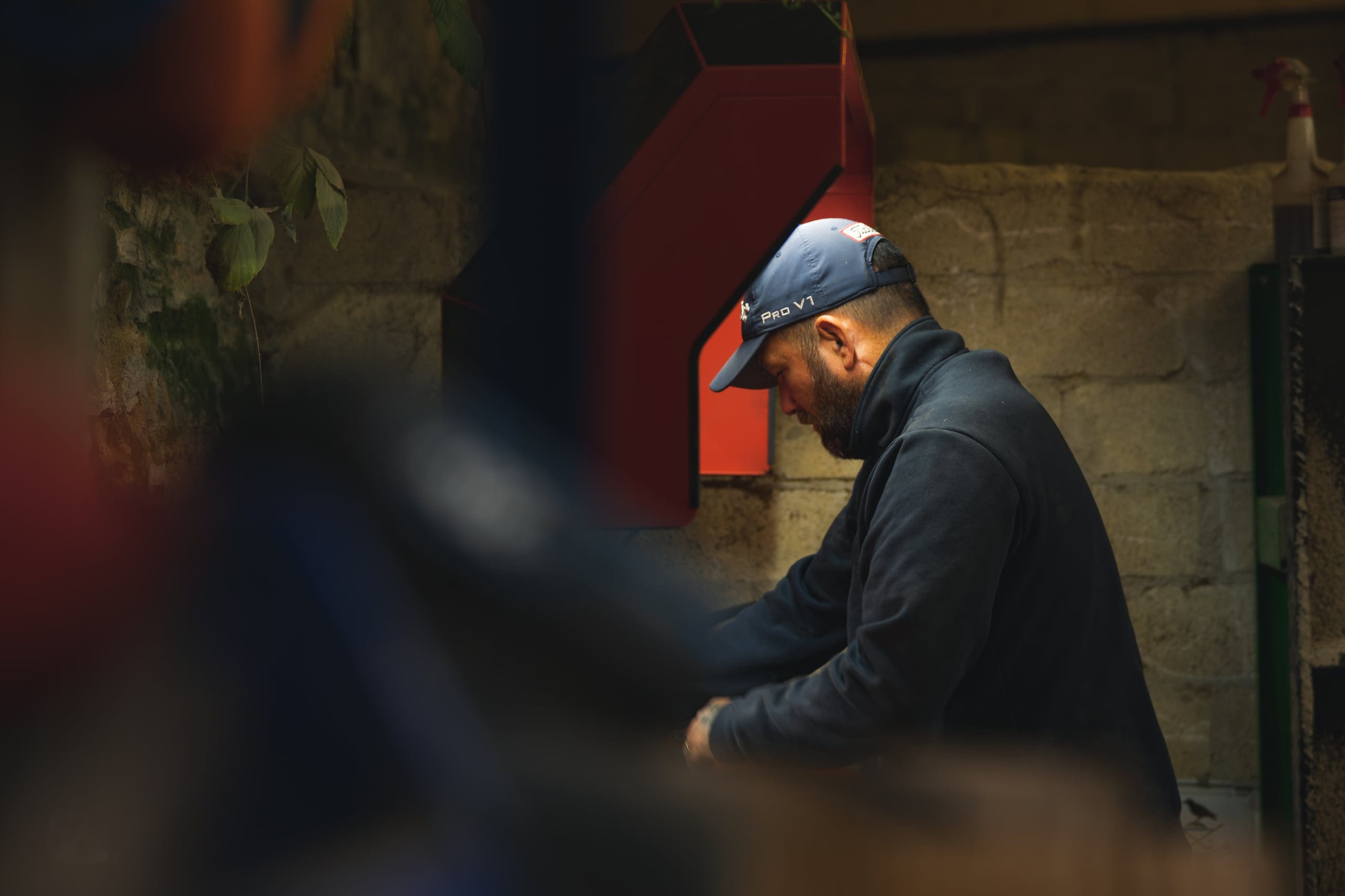 A mechanic at work on a machine in the workshop