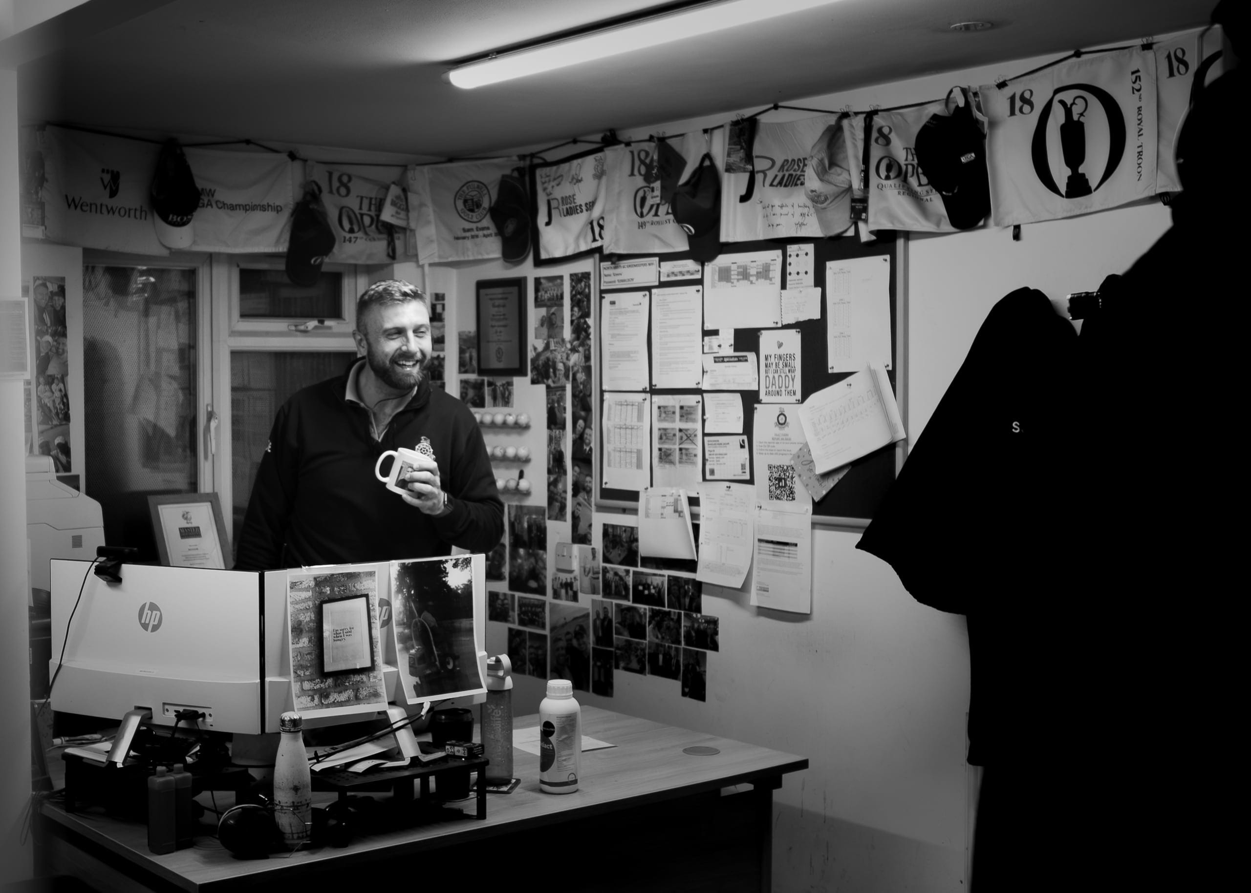 A greenkeeper in the workshop, black and white
