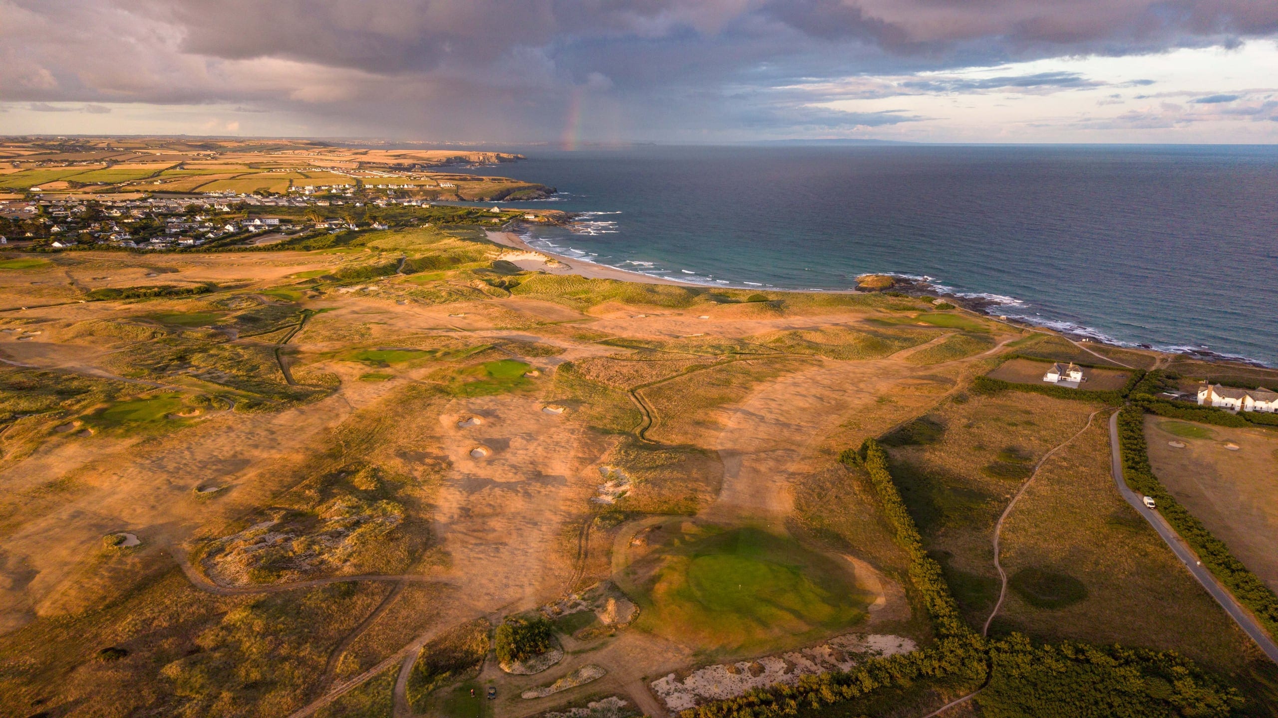 The coastline and links from above in warm afternoon light